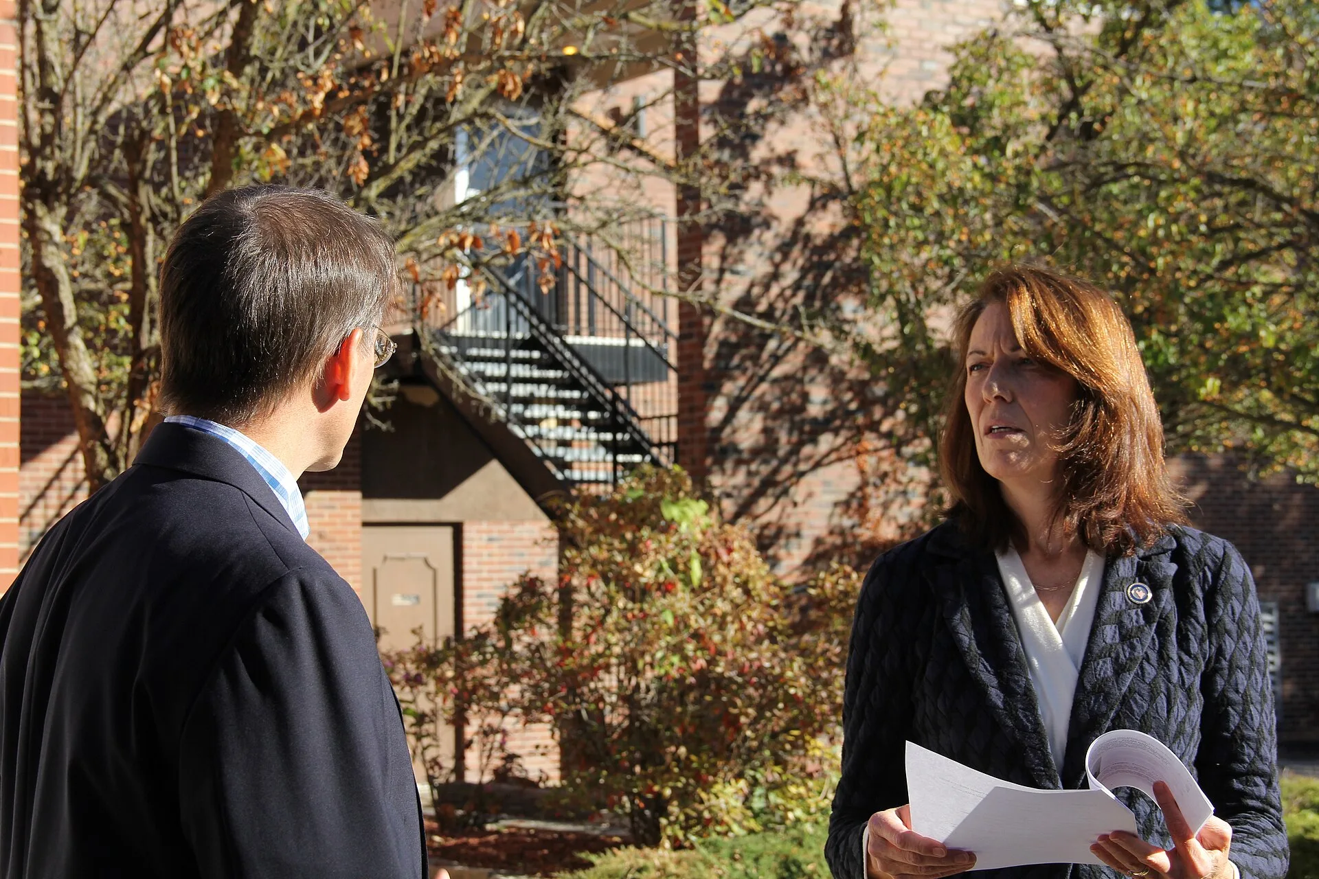 Business Programs Director in Iowa John Ferrell greets U.S. Department of Agriculture (USDA) Rural Development Senior Advisor for Rural Engagement, Delivery and Prosperity Cindy Axne, prior to their meeting with a grant recipient. Axne announced the Department has awarded $99,000 to a non-profit org