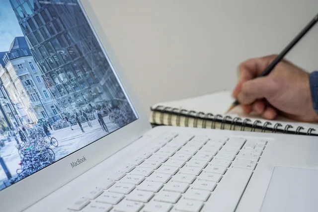 laptop, apple, keyboard, technology, mac, application, software, hardware, people, hand, notebook, notes, blue apple, blue keyboard, blue software, blue note. Small business grants software selection: test the workflow